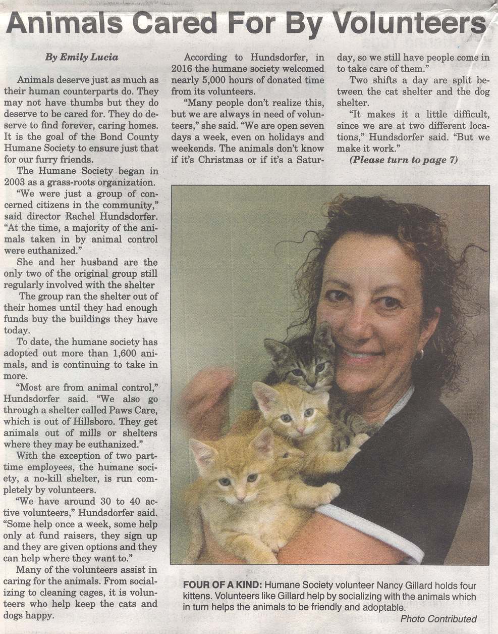 Article part 1 with photo of volunteer holding litter of kittens