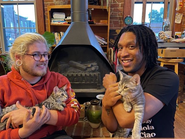 happy family of two men and their two tabby cats Winter and Willow!