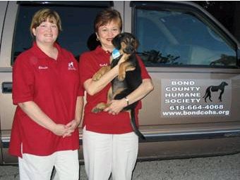 Dixie pup begins her long relay trip to her furever home in New York State, here with BCHS volunteers